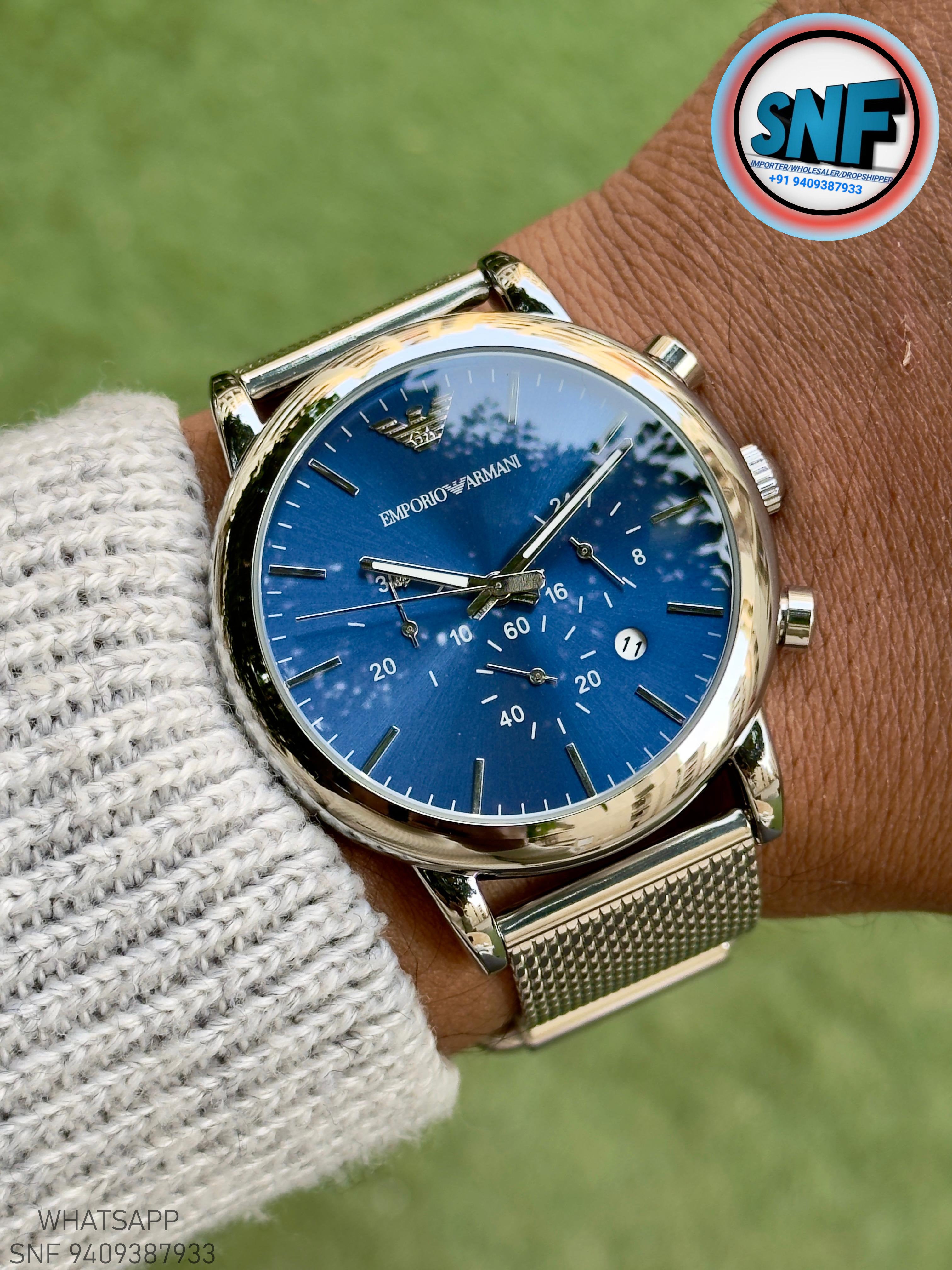 Emporio Armani AR1811 The Sleek Milanese Mesh strap and Bold Blue Dial