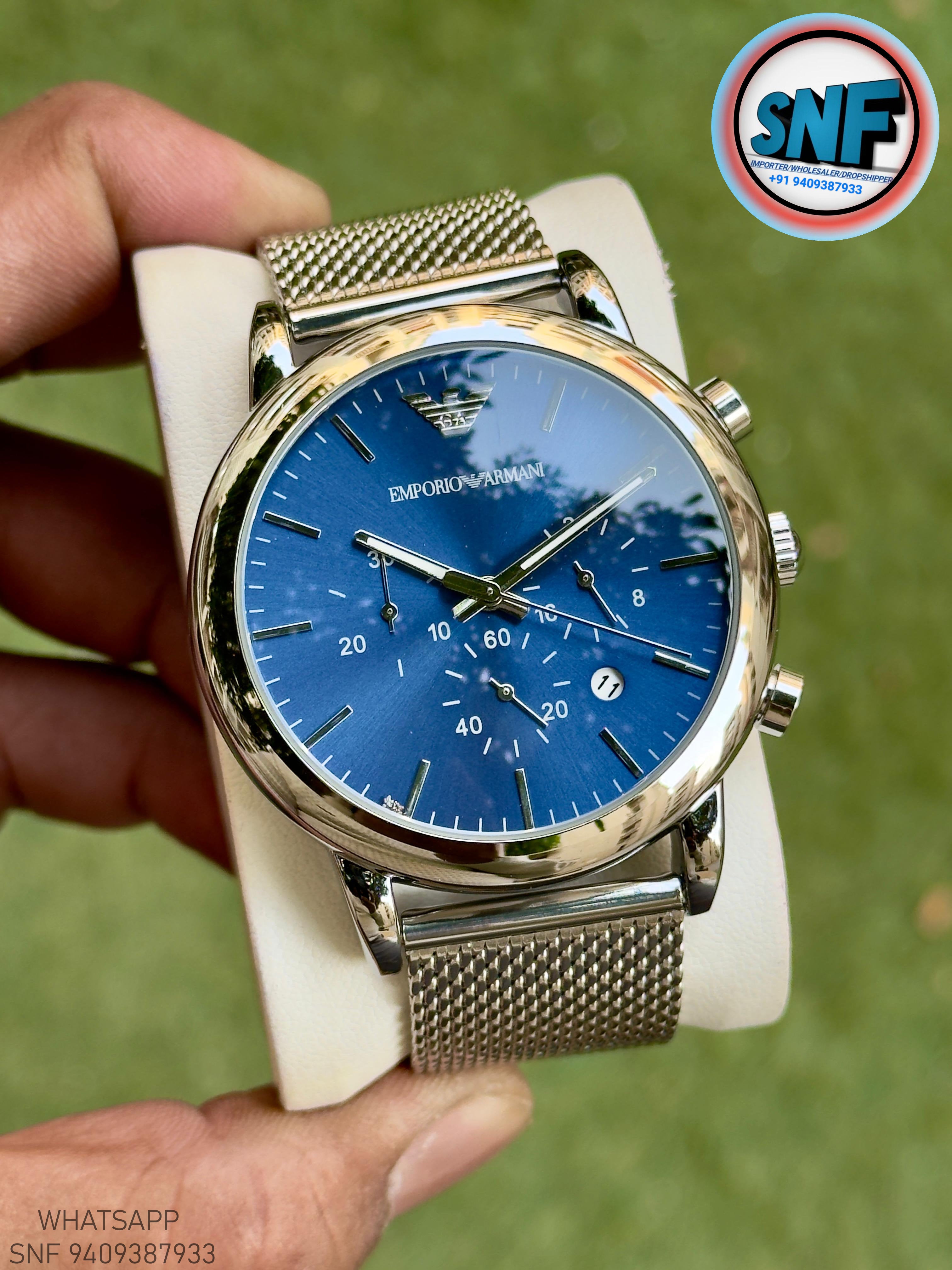 Emporio Armani AR1811 The Sleek Milanese Mesh strap and Bold Blue Dial